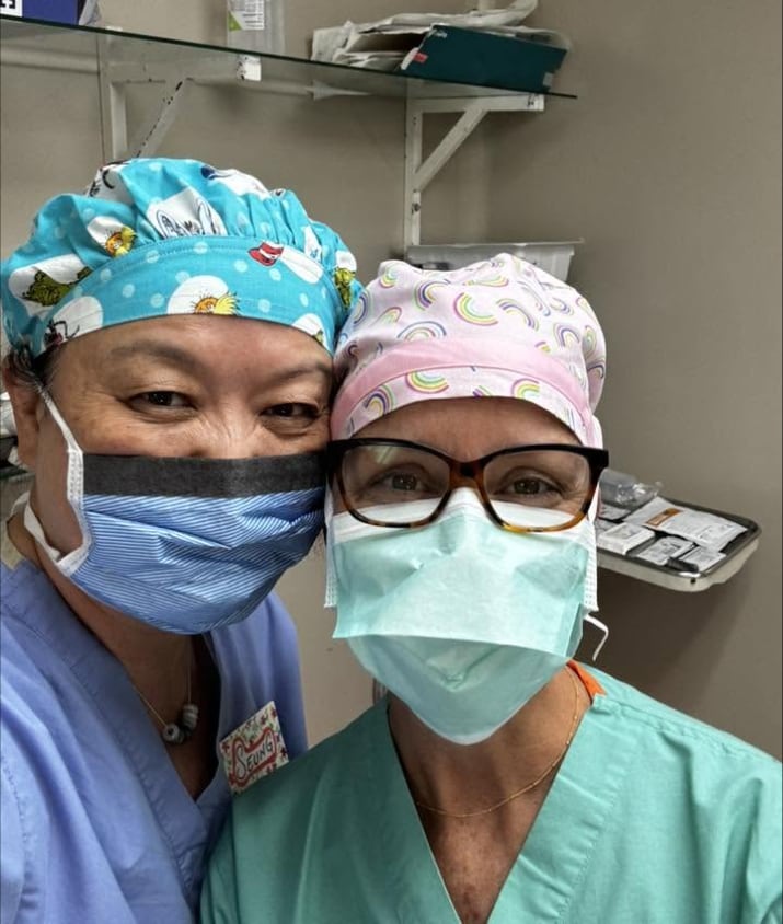 Two volunteers in the operating room