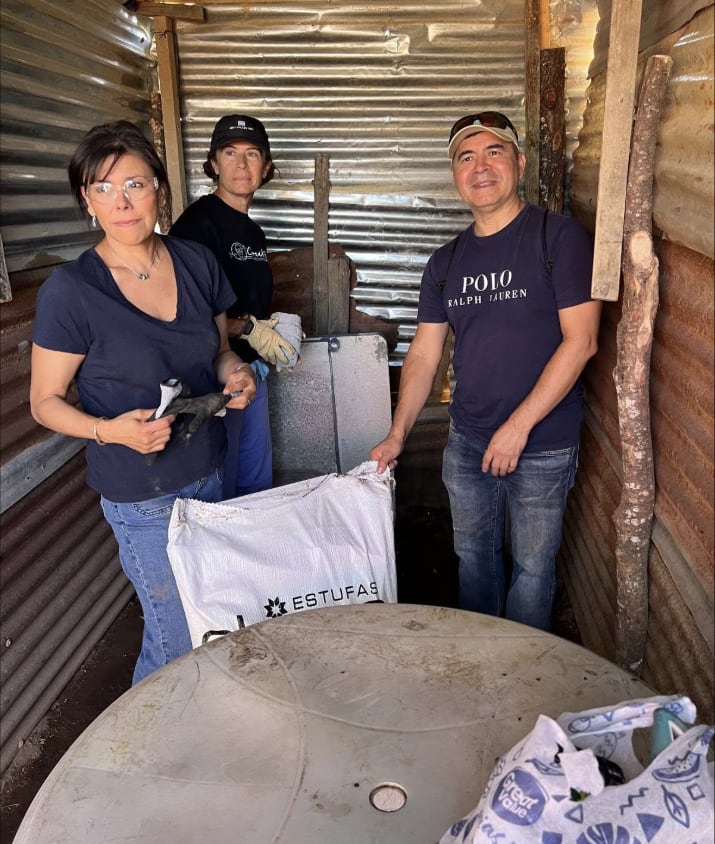 Stove team unpacking a new cookstove